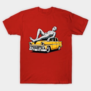 Mummy lying on top of a yellow car T-Shirt